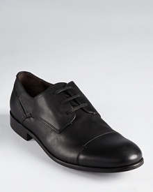 Rich supple leather defines these handsome oxfords, carefully crafted with a designer's touch.