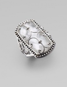 A sophisticated piece adorned in pretty details with a faceted mother-of-pearl doublet, overlaid with a sterling silver scroll pattern and surrounded by a delicate band of dots. Mother-of-pearl doubletSterling silverWidth, about 1Imported 