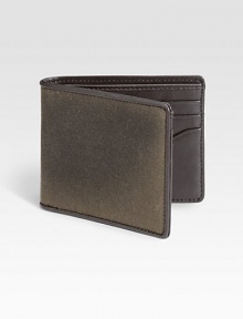 A classic water resistant fabric, waxwear acquires a beautiful patina with age and use. French-edged with leather, this bill holder mixes utilitarian and luxe materials to create a uniquely masculine wallet.One billfold compartmentSix card slotsWaxed cotton/leather4W x 4HImported