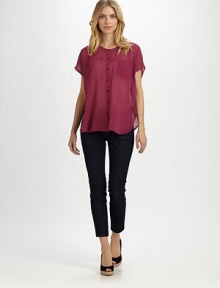 A silk button-down blouse offering a relaxed fit and everyday-chic look.Round neckShort sleevesButton frontAbout 26 from shoulder to hemSilkDry cleanImported