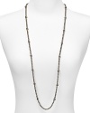 Finish off every look with this elegant rounded chain necklace crafted in shiny silver tone and finished with delicate stations. From Lauren by Ralph Lauren.