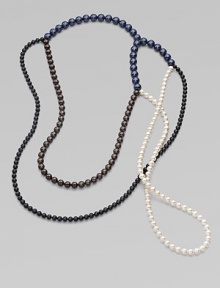 From the Night Blue Collection. This versatile piece features multi-colored strands of pearlized glass beads in an artfully asymmetrical style. Length, about 56½ Slip-on style Imported 