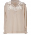 Feminine and chic with its cool nude coloring, Rachel Zoes silk shirt is an elegant workweek essential - Spread collar, long sleeves, buttoned cuffs, gathered shoulder and yolk detail - Loosely fitted - Wear with a pencil skirt and pumps, or over skinny jeans with your favorite flats