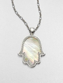 A mano di fatima pendant in iridescent mother-of-pearl surrounded by intricately designed sterling silver on a link chain. Mother-of-pearlSterling silverLength, about 18 to 20 adjustablePendant size, about 2.5Lobster claspImported 