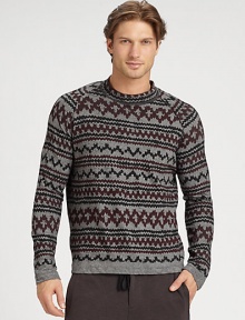 A slub-cotton style with an intriguing print and classic raglan sleeves.Pullover styleRaglan sleevesAbout 33 from shoulder to hem65% cotton/35% polyesterDry cleanImported