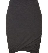 Sumptuously soft and effortlessly elegant, Donna Karans pure, charcoal grey cashmere knit skirt epitomizes understated luxury - Curve-hugging, medium-rise pull on style with hidden elasticated waist - Gorgeous signature drape and twist detail at hem - A chic go-to in any wardrobe perfect for pairing with cashmere pullovers, silk tops or button downs and ankle booties or platform pumps