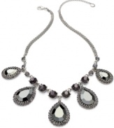 Alfani's statement necklace is crafted from hematite tone mixed metal with an array of black and gray glass stones for an alluring effect. Crafted in hematite tone mixed metal. Approximate length: 18 inches + 3-inch extender. Approximate drop: 1-1/2 inches.