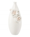 Sculpted camellia blossoms pop with peachy accents against this glossy white Flora vase. A quiet beauty in graceful Lenox porcelain. Qualifies for Rebate