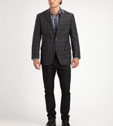 Decorative leather trim at the collar styles a handsome sportcoat design patterned with classic windowpane print in superior wool.Button-frontNotch lapelChest welt, waist flap pocketsSide ventsWoolDry cleanImported