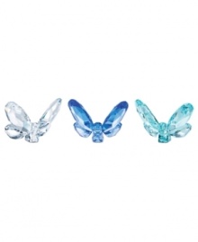 Faceted crystal butterflies in three shades of blue work as a trio or individually to freshen up a room. Perch on a potted plant, armoire or bookshelf.