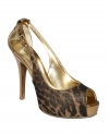 Animal print is set ablaze thanks to this glittery fabric. GUESS's Hondola platform pumps feature a covered back and ankle strap that gives the illusion of cutouts. Sexy and on-trend.