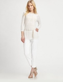 Intricate crochet meets a luxurious combination of cotton and silk to create the quintessential sweater, with a bohemian, braided belt.BoatneckThree-quarter sleevesBraided, self-tie beltAbout 24 from shoulder to hem79% cotton/18% viscose/3% silkDry cleanImported Model shown is 5'10 (177cm) wearing US size Small. 