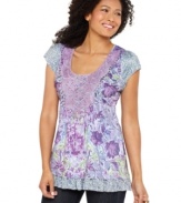 One World's floral tunic features a feminine lace yoke and a tiered hem. Studs give it just the right amount of edge!