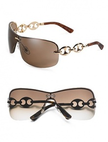 Rimless three-piece mount with marina chain temple. Available in gold frames with brown lens and chocolate frames with gray lens. Metal Made in Italy 