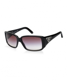 Introduced in the 1980s, the Prada triangle logo is the classic icon of the brand. This popular style has been updated in black and features a logo that is simply Prada. Lenses are rose and gradient.