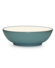 Make everyday meals a little more fun with Colorwave dinnerware from Noritake. Mix and match this rim soup bowl in turquoise and white with coupe and square pieces for a tabletop that's endlessly stylish.