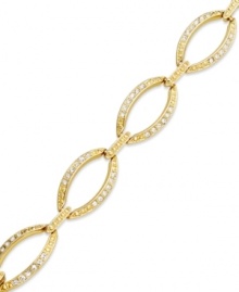 Stay well-connected with this link bracelet from Charter Club. Crafted from gold-tone mixed metal with glass stones adding luster, the bracelet is a stylish choice for any affair. Approximate length: 7 inches.