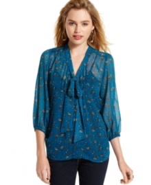 Bow design adds vintage inspiration to this sheer, floral-print top from Eyeshadow!