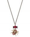 Enter Betsey Johnson's web of influence with this pendant necklace, featuring a spider motif. Crafted from gold-tone mixed metal and adorned with flower details and glass crystal accents, the pendant is an eight-legged friend to enjoy. Approximate length: 16 inches + 3-inch extender. Approximate drop: 1-1/4 inches.