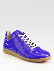 High-gloss, coated leather lace-ups make a statement.Lace-up frontLeather liningPadded insoleRubber soleMade in Italy