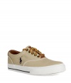 Stylish canvas sneakers in fine, khaki-colored cotton and leather - Designed by Polo Ralph Lauren in classic American prep style - Stylish leather lacing, thick white sole and iconic polo player logo - Wonderfully comfortable and easily slipped on and off - Perfect shoe for any casual outfit of jeans, chinos or shorts