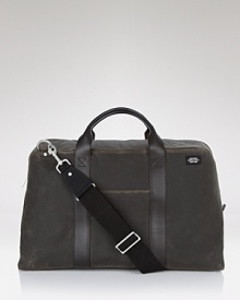 A modern take on the duffle, this Jack Spade duffle bag in rugged waxed cotton exudes getaway cool.