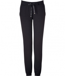 Perfect for pairing with sky-high heels, Juicy Coutures ultra comfy cuffed pants lends an edge of effortless feminine attitude to your outfit - Flat drawstring tie with gold-toned aglets, terry trimmed side slit pockets, fitted cuffs, sweatpant-style - Loosely fitted - Wear with a tee, boyfriend blazer and pumps