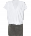 Luxurious dress in fine viscose and suede - White, loose, oversized top with V-neck and short sleeves is contrasted by narrow, suede taupe miniskirt - A dream dress transitions from the boardroom to the lounge when paired with classic heels and favorite accessories