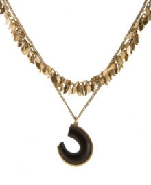 A striking statement maker. Lucky Brand's double strand necklace incorporates a natural wood tusk with gold tone accents. Crafted in gold tone mixed metal. Approximate length: 18 inches + 2-inch extender. Approximate drop: 2-1/2 inches.