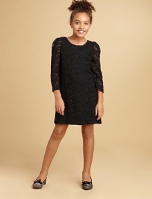 A stunning lace overlay lends a gorgeous touch to a simply irresistible shift dress.ScoopneckLong sleevesBack zipperPolyesterDry cleanImported