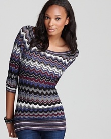 A retro-chic zigzag pattern imbues this GUESS sweater with vibrant style.