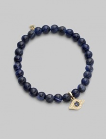 The evil eye, rendered in diamonds and sapphires, makes a graceful amulet, thought to offer protection as it hangs from a stretchy strand of sodalite beads. Diamonds, 0.07 tcw Sapphires Sodalite 14k yellow gold Unstretched diameter, about 2 Imported