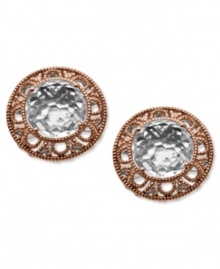 Elegant swirls with a touch of vintage appeal. Town & Country's beautiful stud earrings combine a sterling silver and cut-out 14k rose gold setting with stunning round-cut white quartz (4-1/2 ct. t.w.). Approximate diameter: 5/8 inch.