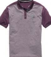 Follow the lines toward this cool classic with an eye to the street. This Sean John polo shirt is the perfect remix.