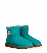 A stylish twist on a venerable classic, the UGG Australia mini Bailey Button boot is a welcome colorful addition to your cold weather casual wardrobe - Crafted from twin-faced sheepskin and featuring exposed seams, reinforced heel, traction outsole, signature UGG label, wooden button and elastic band closure, fleece-lined for superior warmth and comfort - Newer, ankle-height - Truly versatile, perfect for pairing with everything from skinny jeans to yoga pants to mini-skirts