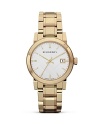 This simple, round watch from Burberry makes an unforgettable impression. Crafted of gold-plated stainless steel with a classic profile, it models sleek, timeless style.