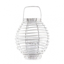 Bring the outside in! Woodsy and inviting, this lantern adds rustic chic to patios or terraces.