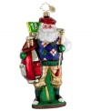 A very special Christmas caddy, Santa Claus putts your tree over the top in head-to-toe holiday plaid. The perfect ornament for the golfer in your family, with the handcrafted brilliance of Christopher Radko.