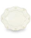 Serve every main course with exquisite taste. Featuring a raised pattern of cascading vines, elegant fluting and a gently scalloped rim, this large oval platter brings distinctly vintage style to the table. Coordinates with Butler's Pantry dinnerware and dishes collection. Qualifies for Rebate