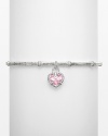 Heart-shaped pink crystal stone on a textured sterling silver linen bangle. Designed by Judith Ripka.