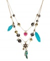 Don't be a featherweight. Betsey Johnson's fashionable and flighty necklace features a crystal-accented turquoise parrot, multicolored wings, a leopard flower, a faceted crystal heart, turquoise feathers and leopard and gold tone beads. Accents and delicate 3-strand chain crafted in gold tone mixed metal. Approximate length: 16 inches + 3-inch extender. Approximate drop: 3-1/2 inches.