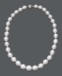 The gift of a lifetime -- elegant pearls are a timeless tradition. This polished strand features graduated, cultured South Sea pearls (10-13 mm) with a 14k white gold clasp. Approximate length: 18 inches.