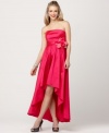 JS Collections' taffeta dress comes with an elegant surprise: a hint of leg peeking out!