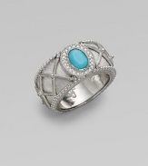 Textured sterling silver features vibrant turquoise richly framed in sparkling diamonds.Diamond, 0.11 tcw Sterling silver Width, about ½ Imported