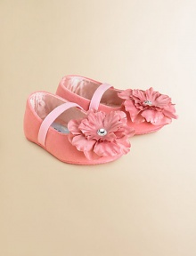 A large fabric flower blooms on the vamp of these charming ballet flats with elastic strap for easy on and off.Slip-on with elastic strapPolyurethane upperSatin liningPolyurethane solePadded insoleImported