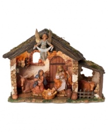 A warm & hopeful glow illuminates the humble stable where Mary, Joseph and a triumphant angel share a quiet, adoring moment. Crumbling brick walls and a menagerie of livestock surround the glorious baby Jesus as he lays his head in the manger.