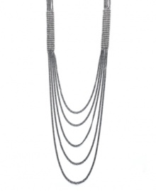 Draped and dramatic. Unveil a whole, new look in Bar III's five-tier necklace. Hematite tone mixed metal chains combine with sparkling crystals to add elaborate detail. Approximate length: 19 inches. Approximate drop: 9 inches.