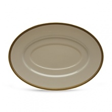 Tuxedo dinnerware is the epitome of formal dinnerware. The ivory fine china contrasts vibrantly against the rich gold interwoven accents. It's definitely a classic Lenox pattern. Pair it with gold-accented sterling and crystal, for elaborate entertaining. Dishwasher Safe.