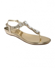 Rhinestones everywhere. Make your outfit shine with Marc Fisher's Lieseo flat thong sandals.