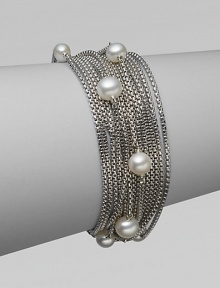 From the Pearl Collection. Multiple rows of sterling silver box chains with a random array of pearls.Pearl Sterling silver Length, about 7½ Push lock clasp closure Imported 